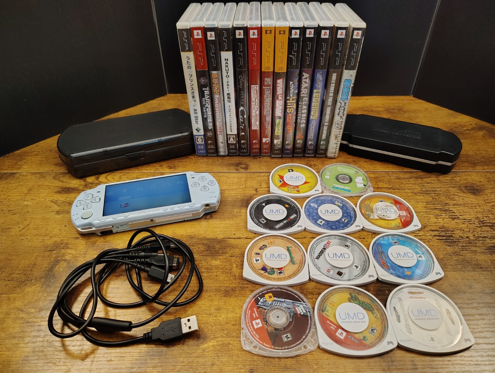 SILVER Sony PSP 2000 System Bundle With Games, Movies, And Cases