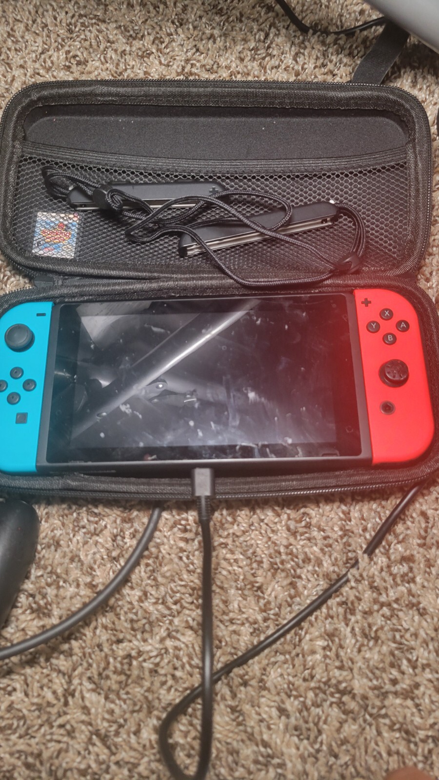 Nintendo Switch with Blue and Red Joy-Con Controllers & Mario Kart