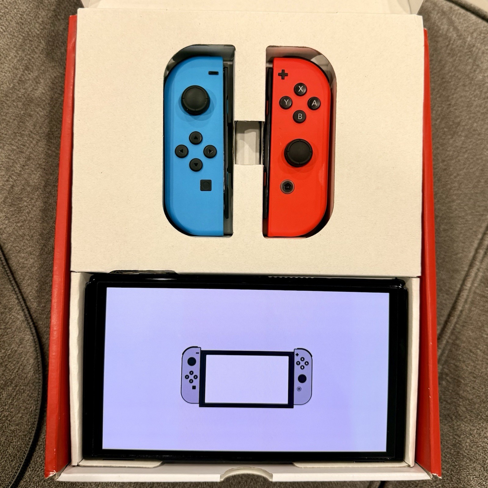 Nintendo Switch OLED Model Handheld Console – 64GB – Black/Neon Red/Neon Blue