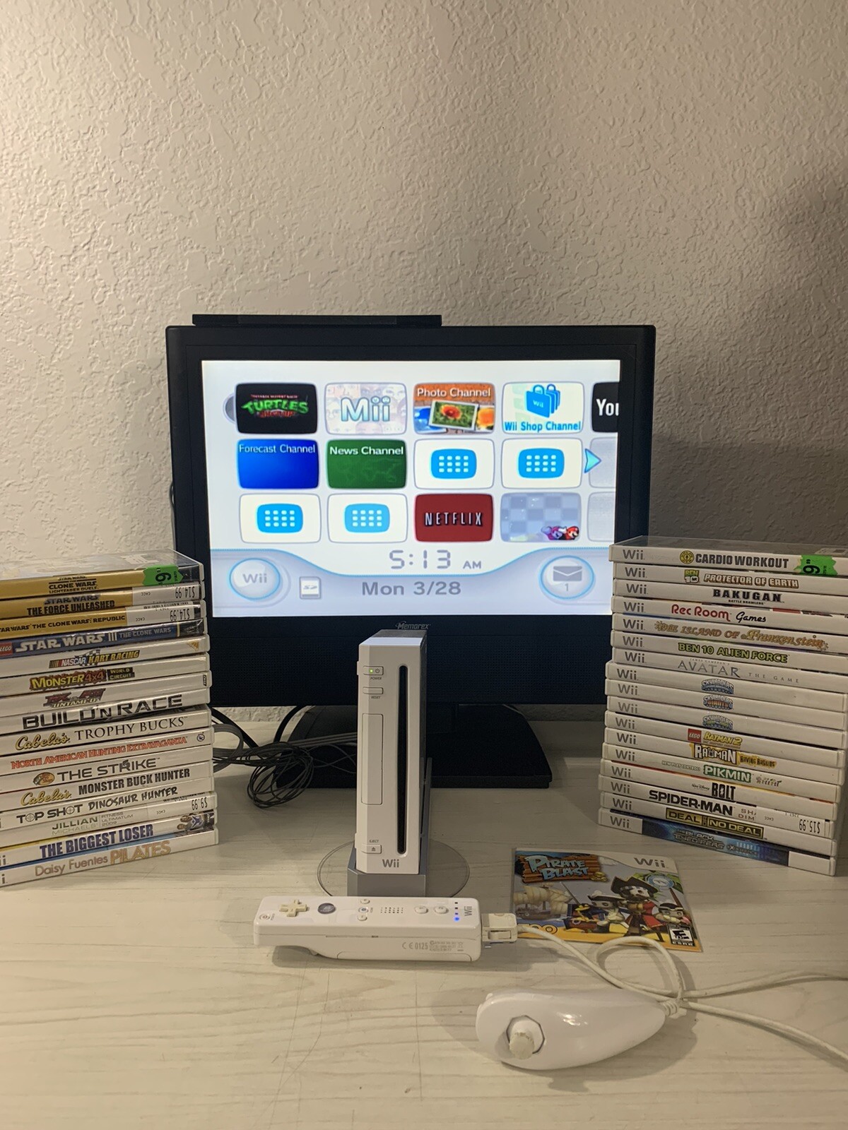 Nintendo RVL-100 Wii Bundle with 35 Games 1 controller 1 Nunchuk Stand Cables
