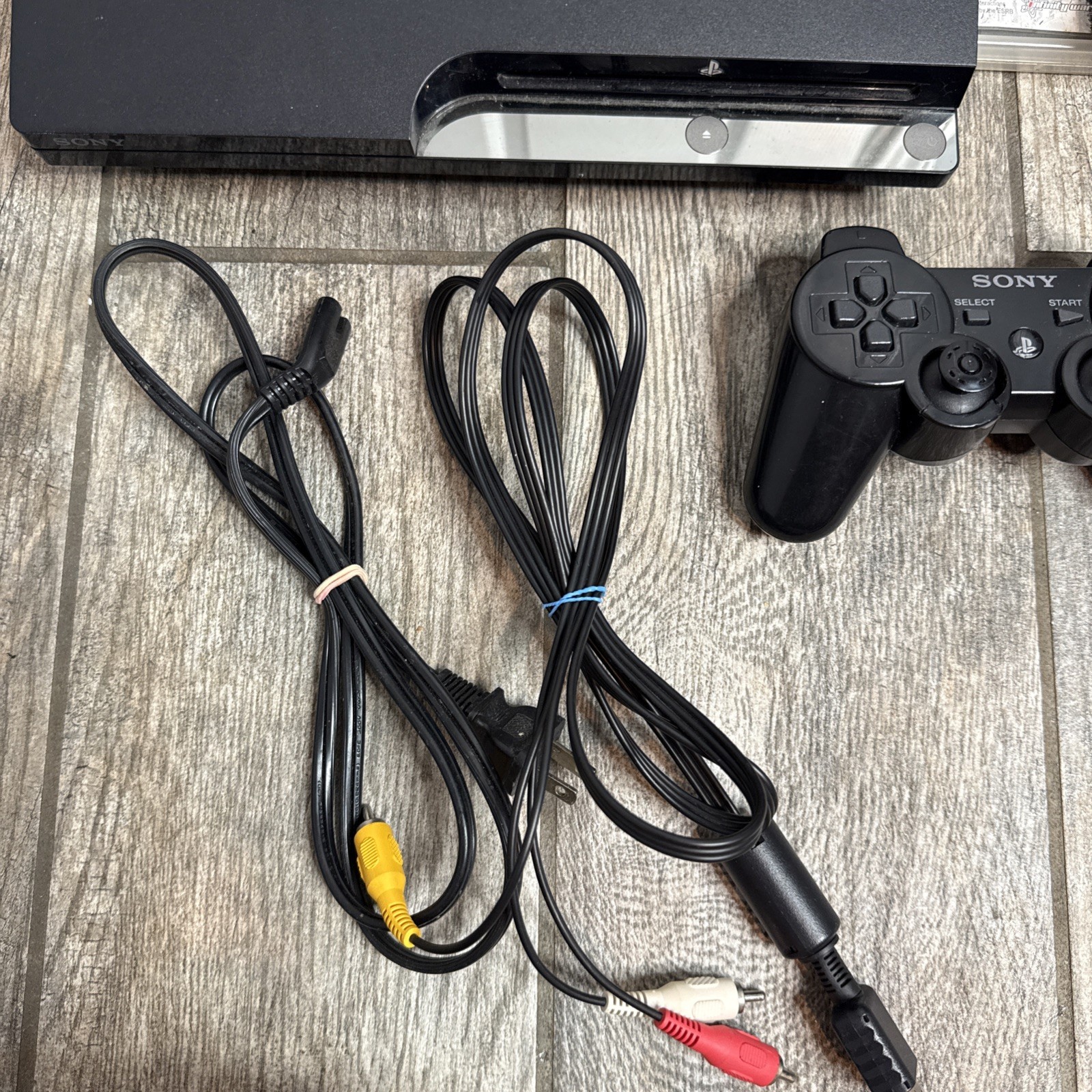 Sony PlayStation 3 Slim 160GB Console CECH-2501A 7 games included