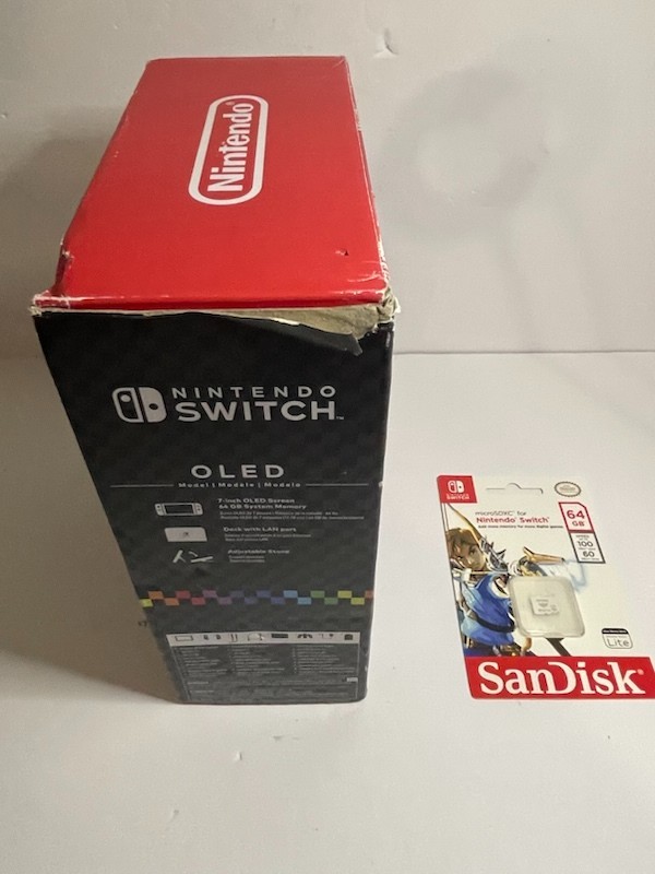 Nintendo Switch OLED – White Joycon With 64gb SD card (no game included)