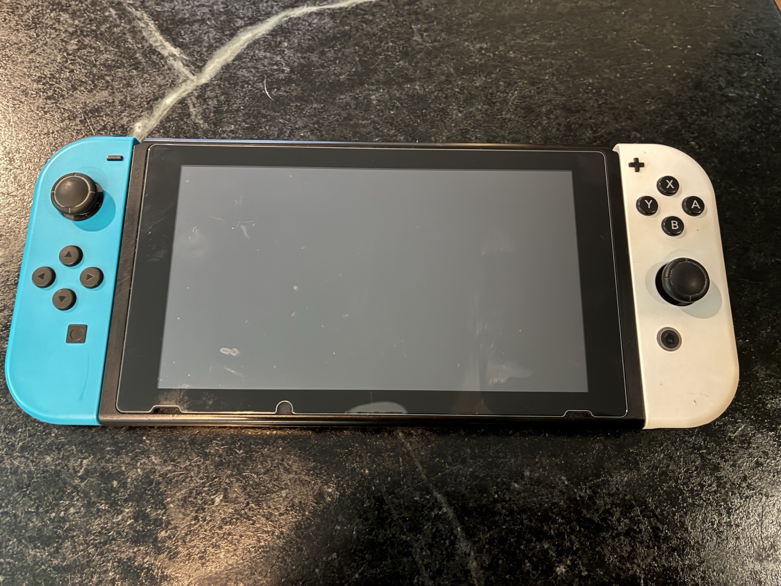 Used Nintendo Switch with Pro Controller in excellent condition