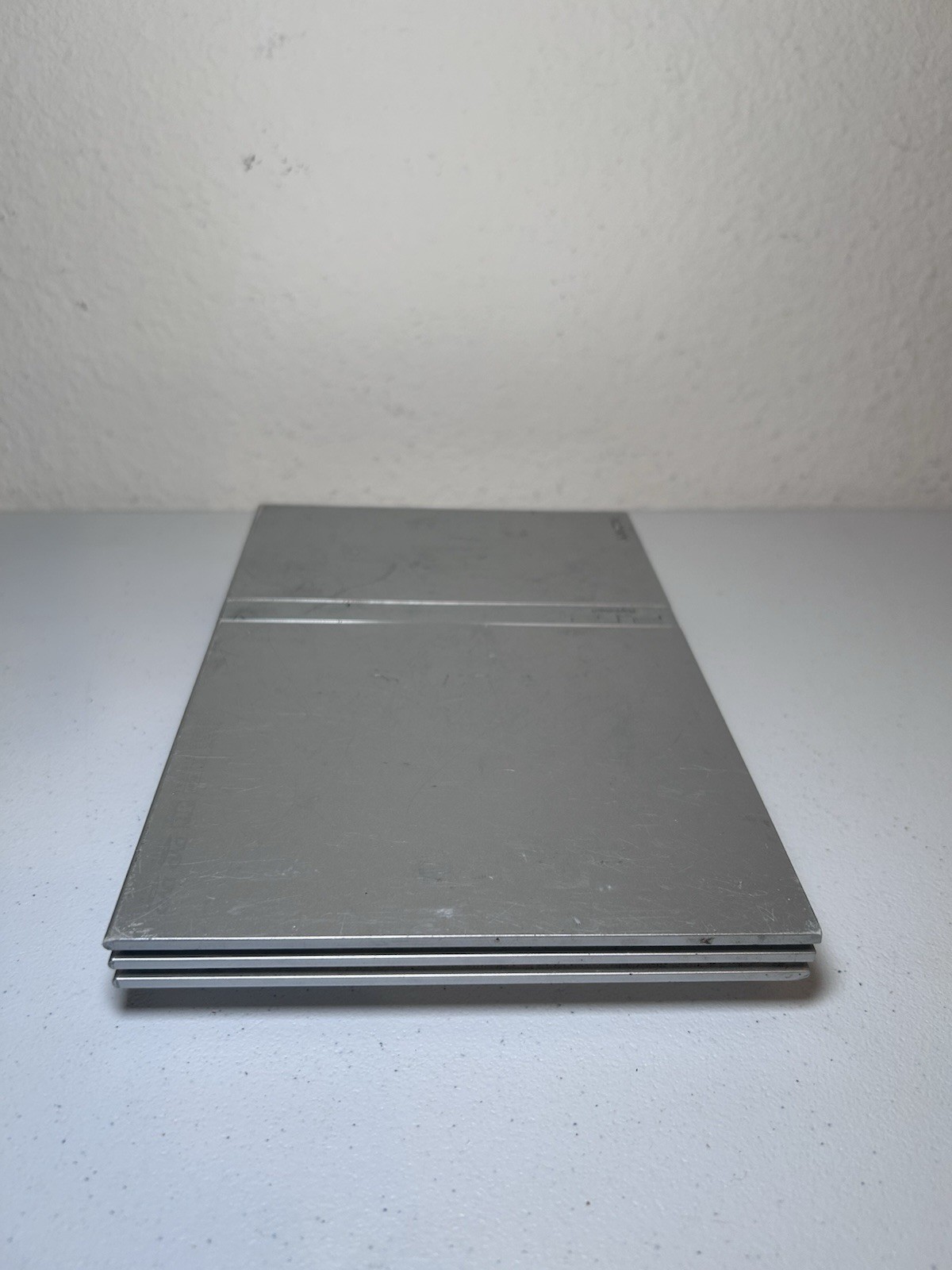 Sony PlayStation 2 Slim Silver (SCPH-79001) Bundle With Controller And Cords