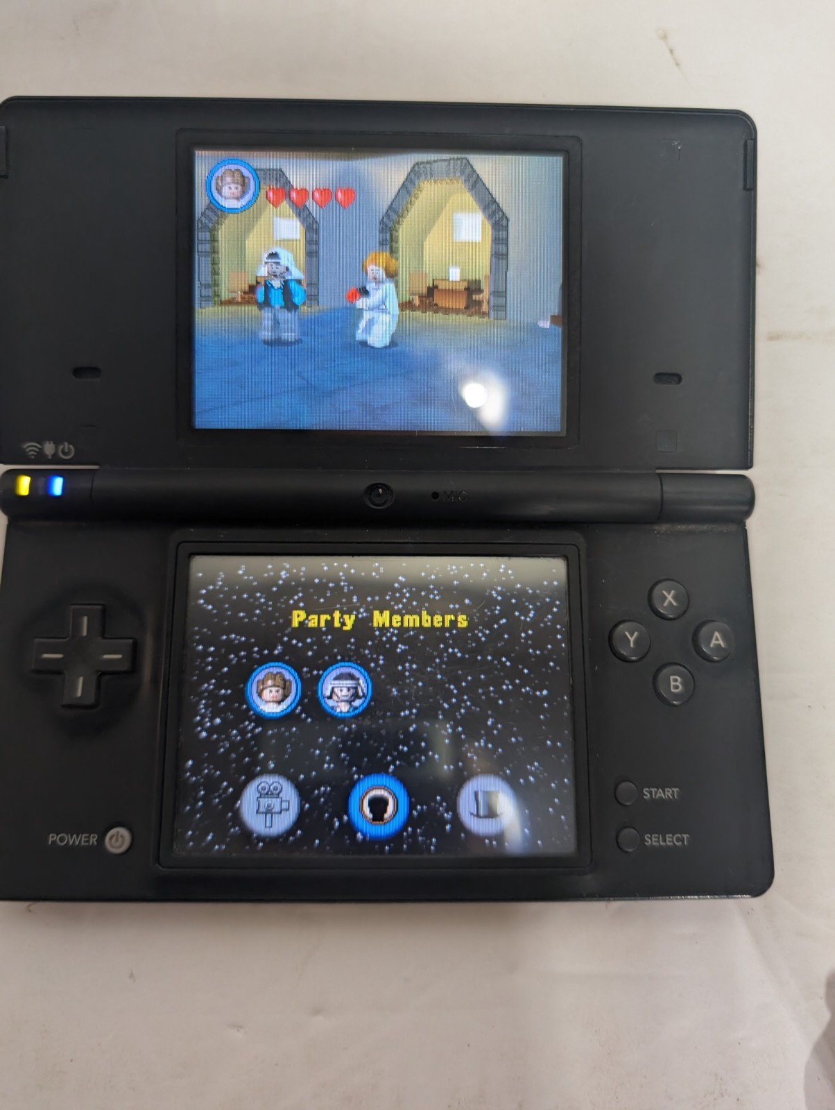Nintendo DSi Black Console + Charger + Stylus + LEGO Star Wars II–Tested Working
