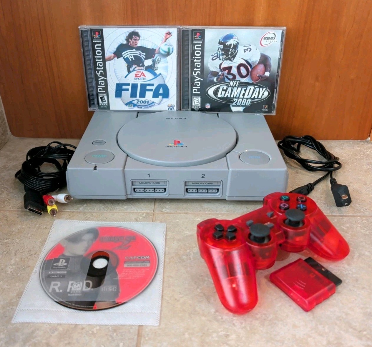 Sony PS1 Console Bundle Clean Tested + RE2 Leon Disc Only + 2 Sports Games CIB