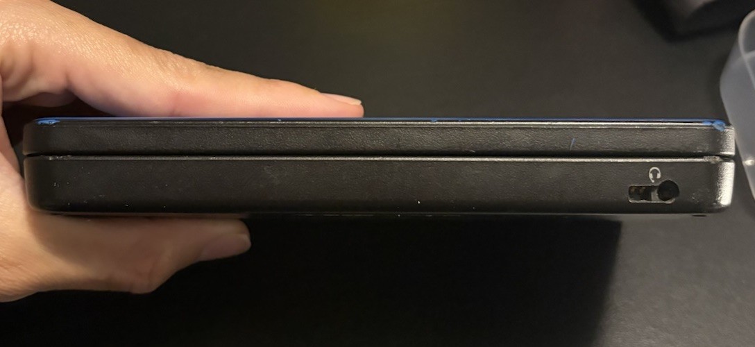 Nintendo DSi XL Midnight w/ USB charger, includes 2 Games, no stylus