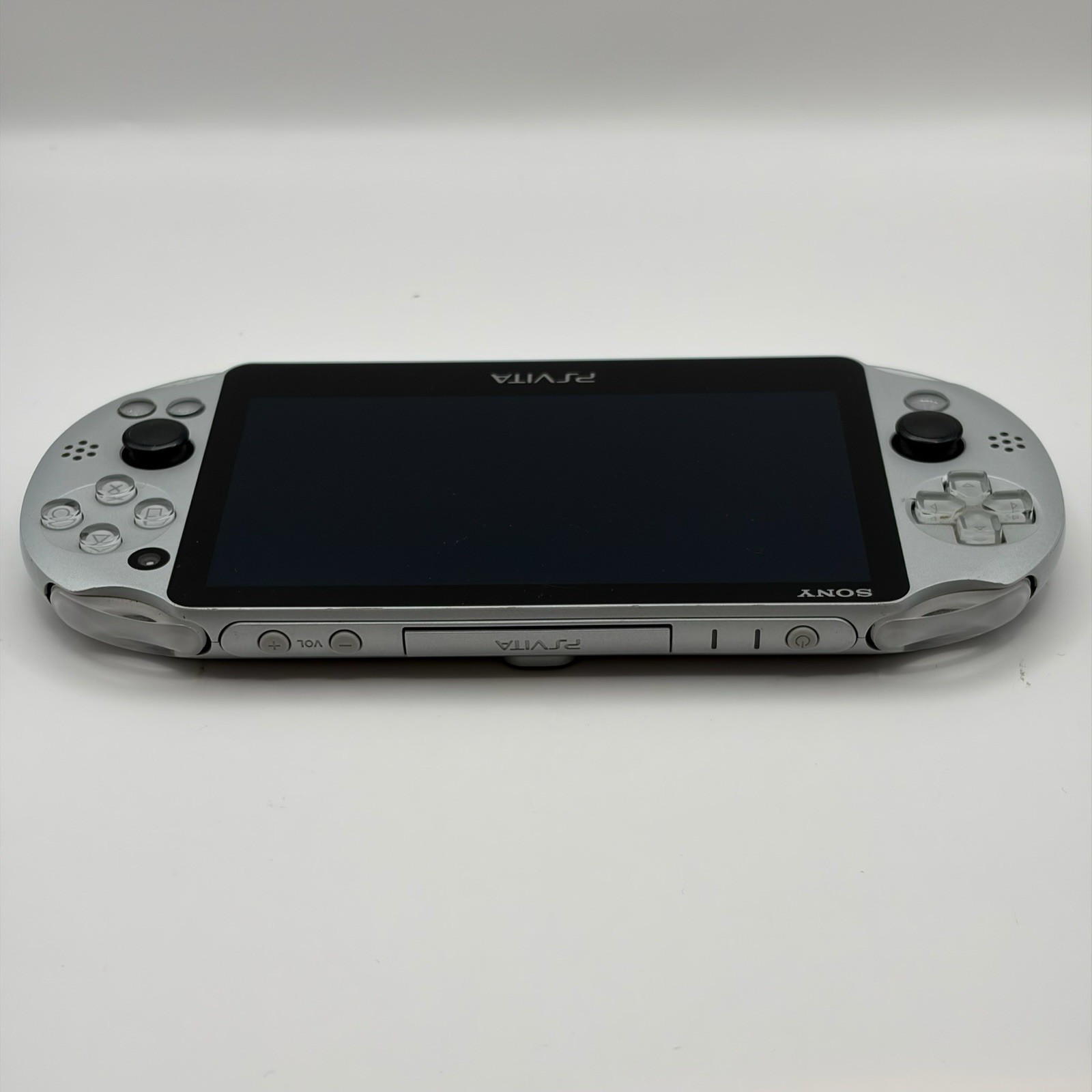 SONY PS Vita PCH-2000 Console Silver Very Good Fast Shipping No joystick drift.