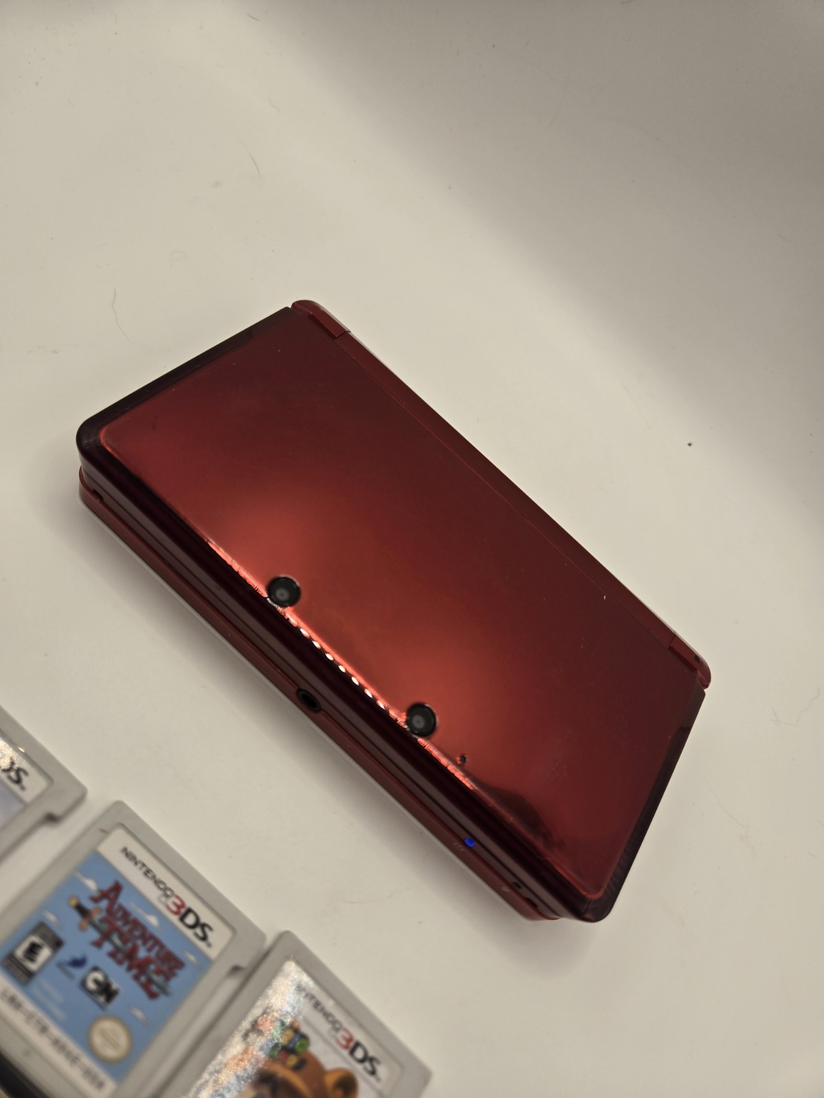 Nintendo 3DS Metallic Red Console System with 7 GamesNo Charger No Stylus