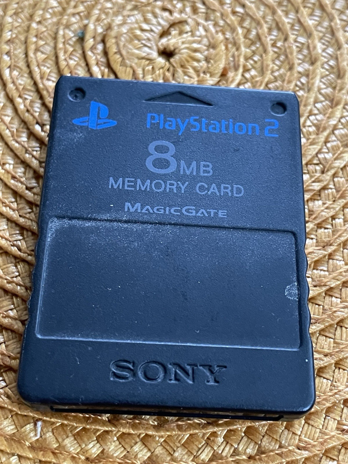 A Logitech PID VV-534 Cordless Action Controller And, A PS-2 8 MB Memory Card