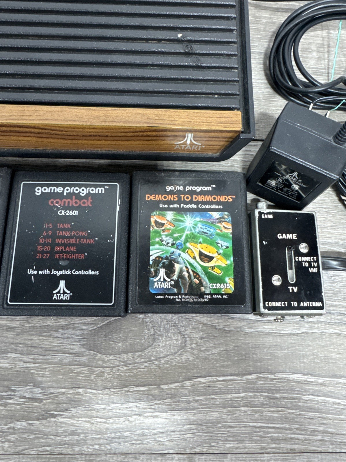 Atari 2600 4-Switch Woodgrain Console Bundle w/ 2 Joysticks, 4 Games Working