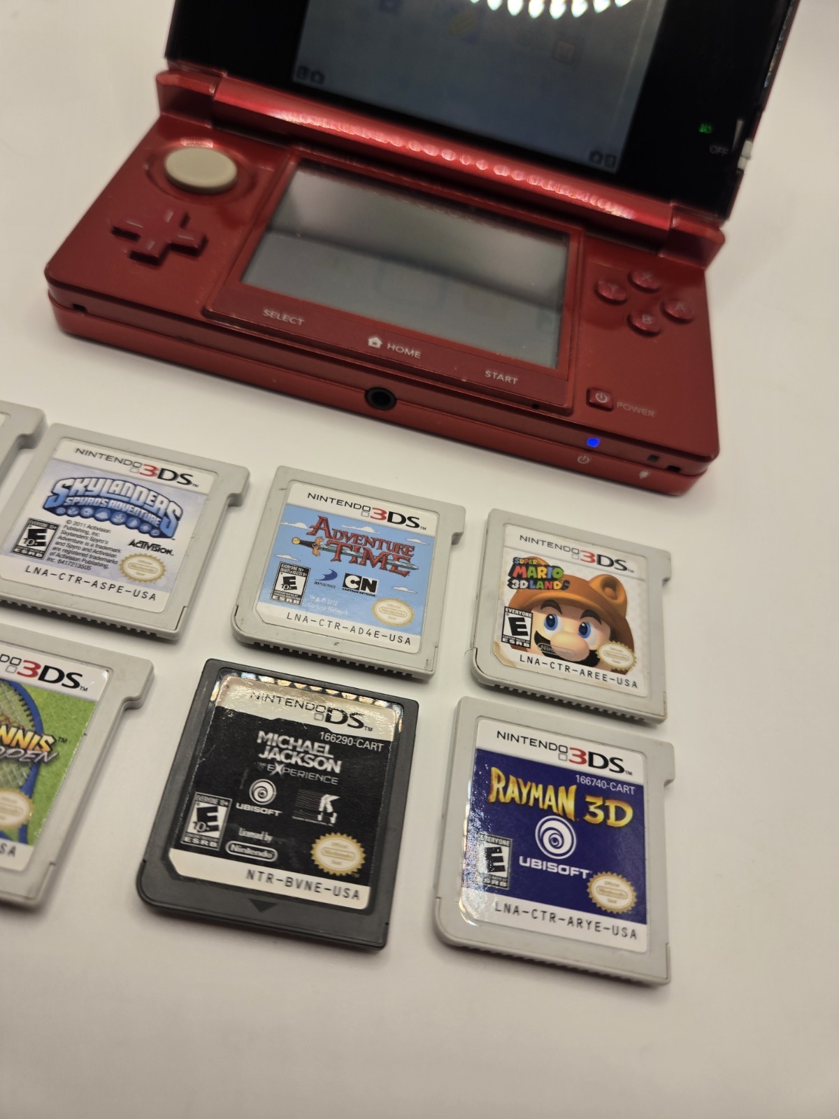 Nintendo 3DS Metallic Red Console System with 7 GamesNo Charger No Stylus