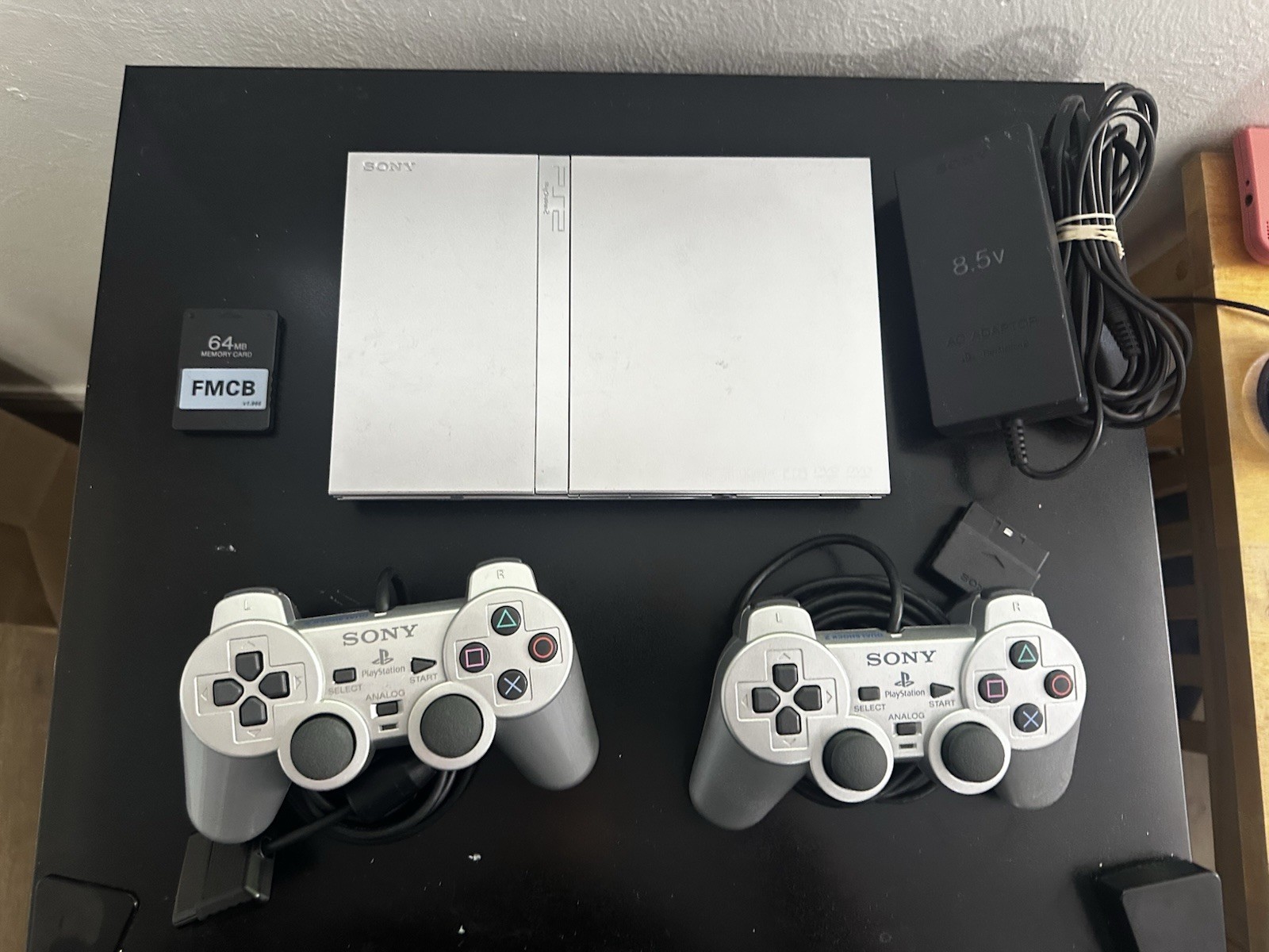 Sony PlayStation 2 Slim Silver w/2 Controllers, HDMI Adapter, FreeMcboot Bundle