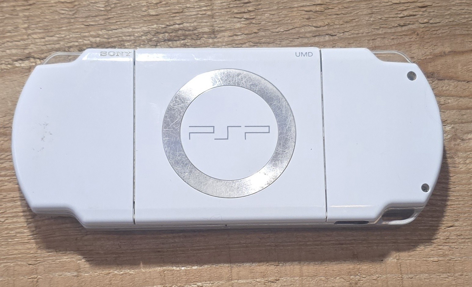 White Psp 2000 With Charger. The System Has Been Tested And Works Great.