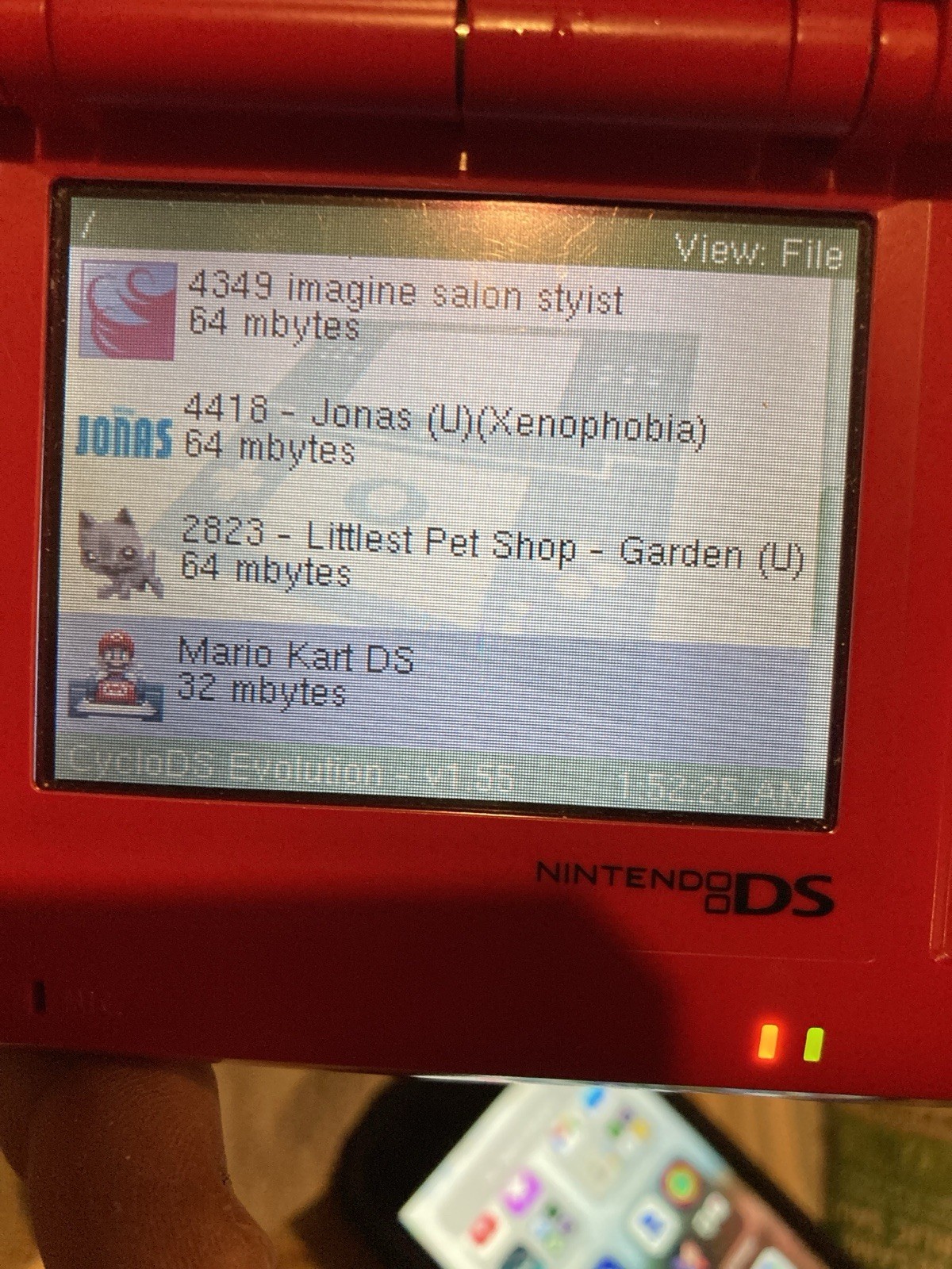 Nintendo DS Red Handheld Dual Screen Console with EVOLUTION MULTI-GAMES ON 2GB