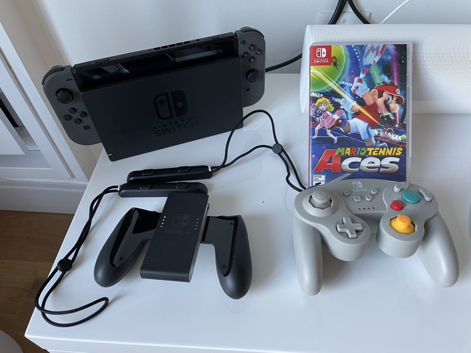 Nintendo Switch with Gray Joy Cons + Dock + Mario Tennis Aces + Extra Controller