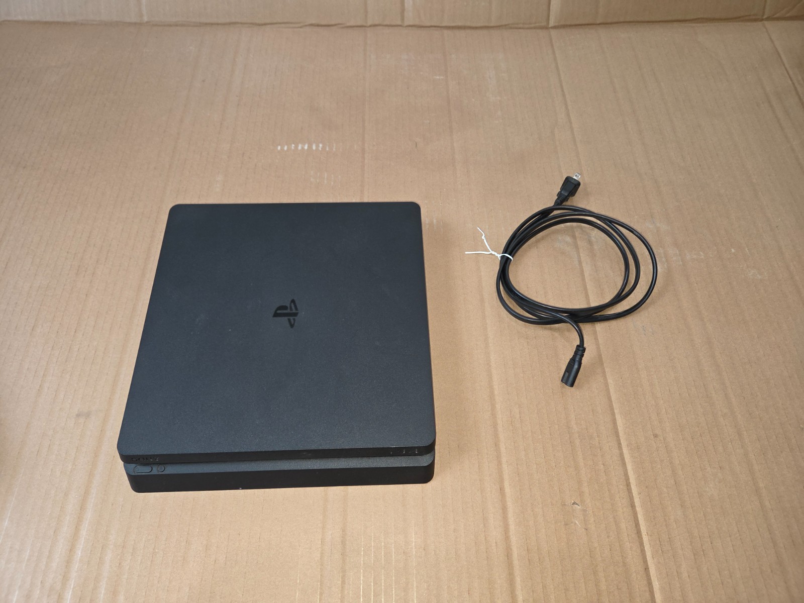 Sony PlayStation 4 Bundle 1TB HDD, 2 Controllers, Charging Mount, Games, and 25$
