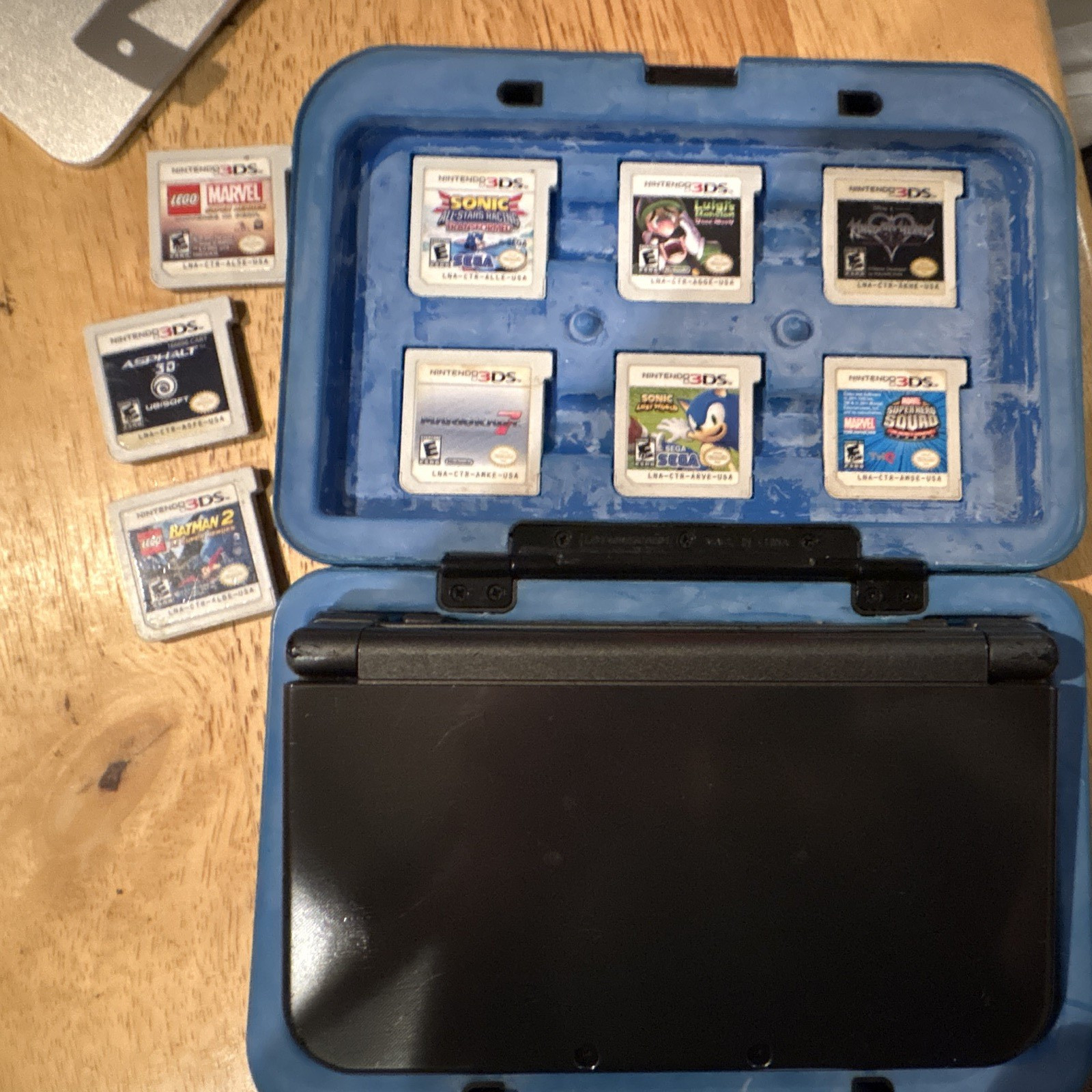 Nintendo 3DS XL Black Handheld System With 3DS Case, 10 games and a charger
