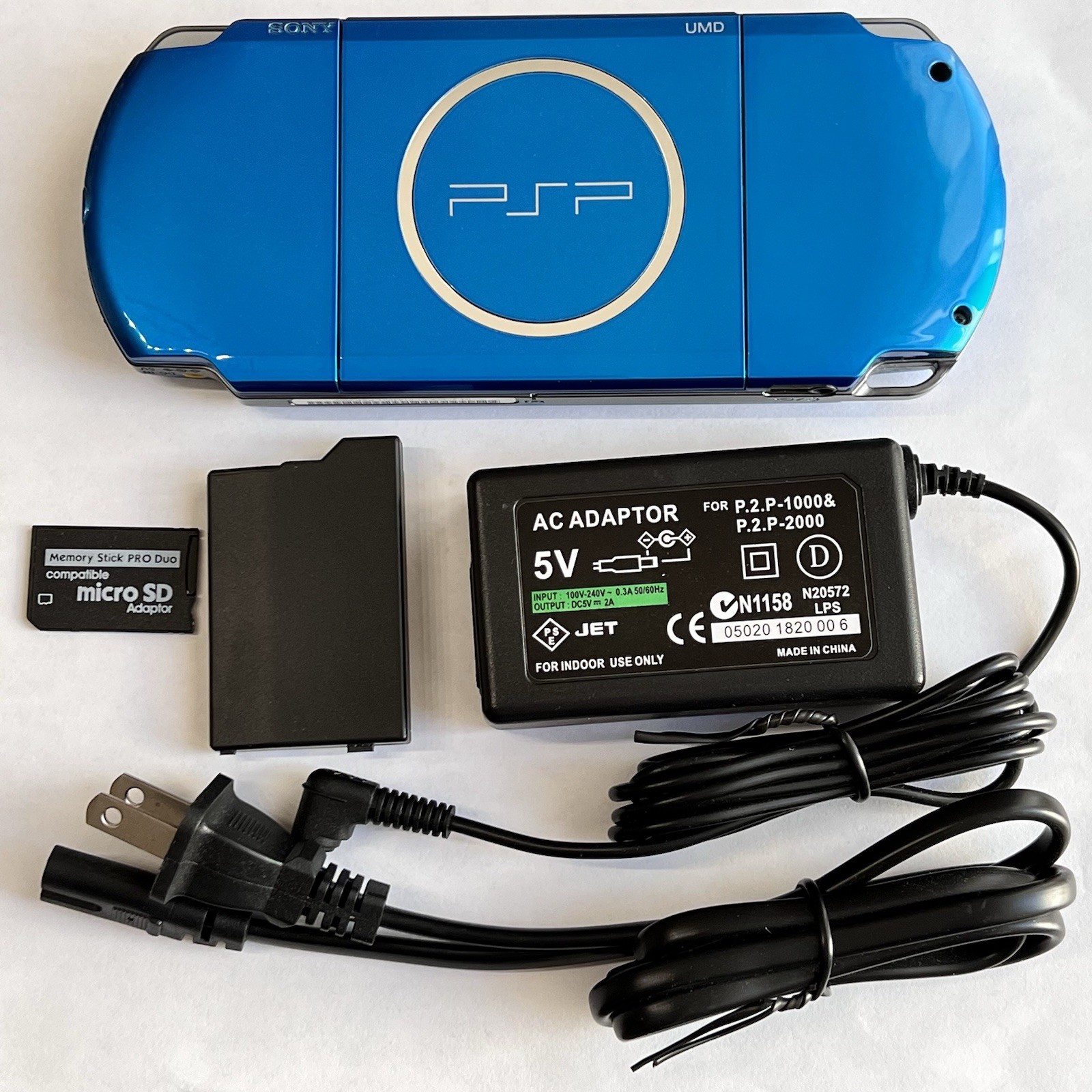 VIBRANT BLUE PSP 3000 System w/ Charger, Battery, 64gb Memory Card Bundle Import