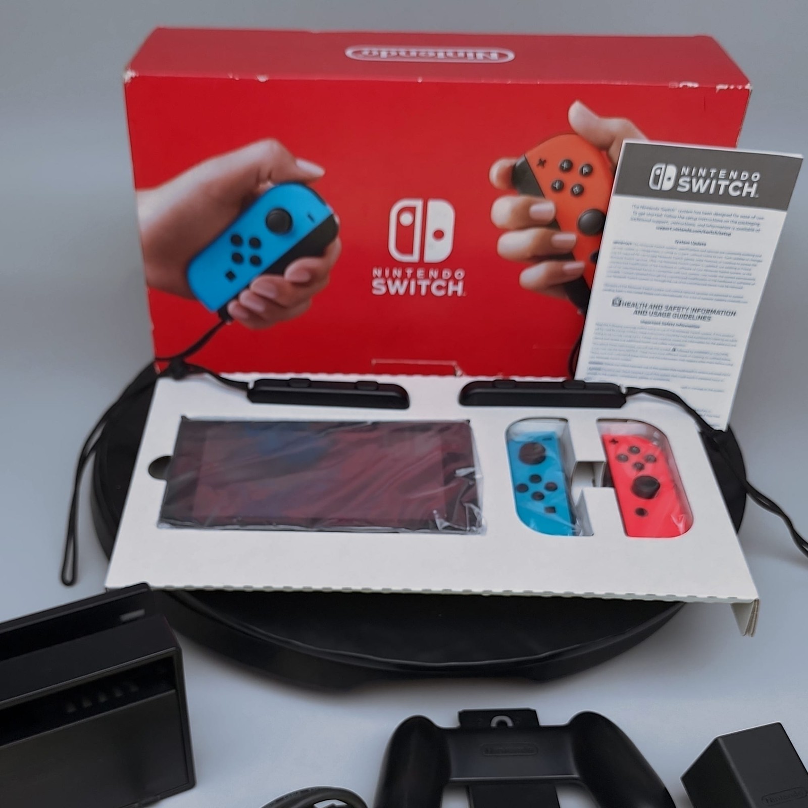Nintendo Switch HAC-001 32GB Neon Red/Blue Joy-Con Console NEW/opened in Box