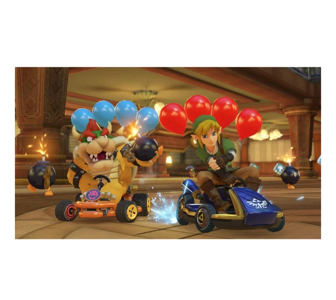 Nintendo Switch plus bonus mystery gift!! Blue and Red Joy-Con Controllers