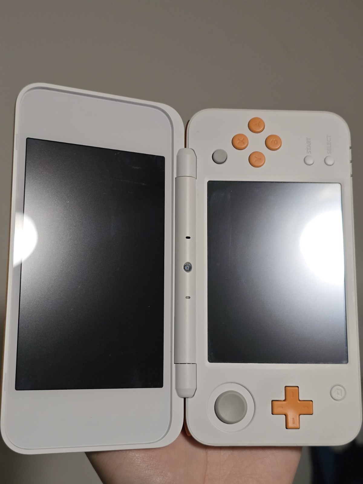 Nintendo 2DS XL Console – White/Orange + Game Cartridge