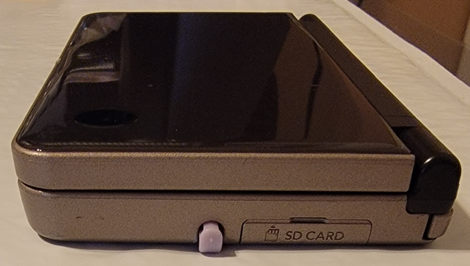 Nintendo DSi XL Bronze w/ Charger & 2 Games Mario 64 DS & New Super Mario Bros