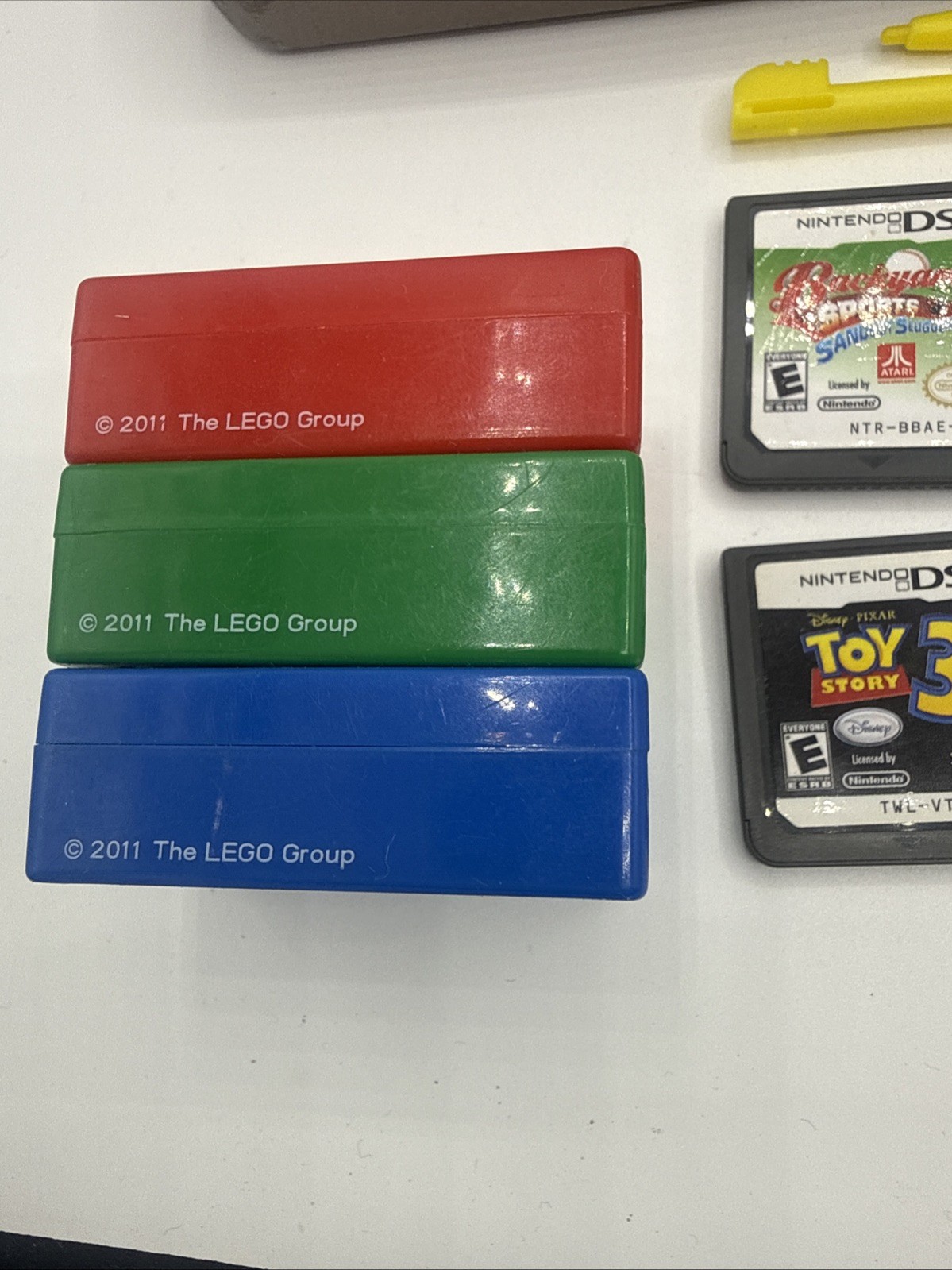 Nintendo DSI XL Handheld Console Bronze UTL-001 Bundle 8 Games, Charger, Stylus