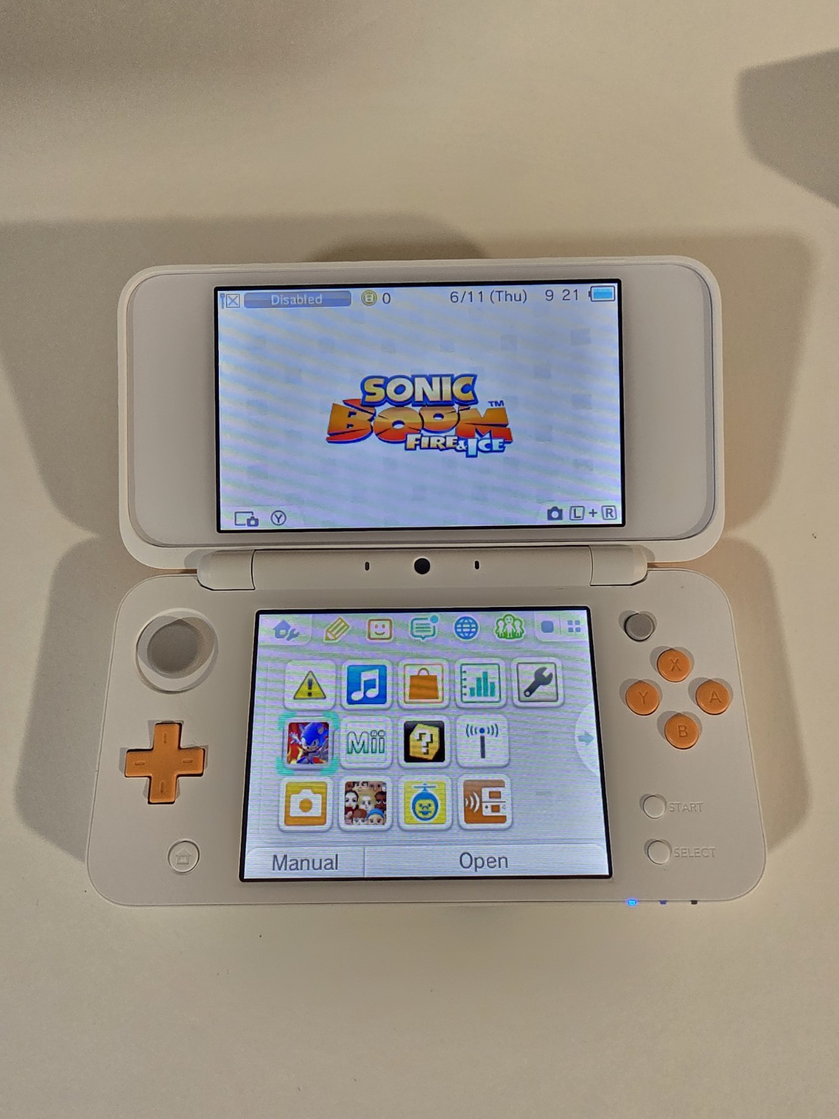 Nintendo 2DS XL Console – White/Orange + Game Cartridge