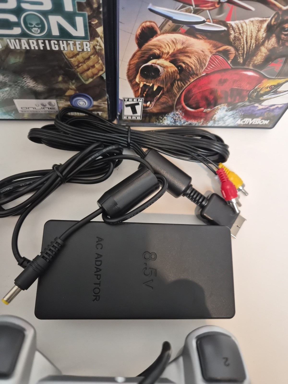NEW LASER Silver PS2 Slim SCPH-77001 Bundle -NEW BATTERY – Cleaned 4 games Cords