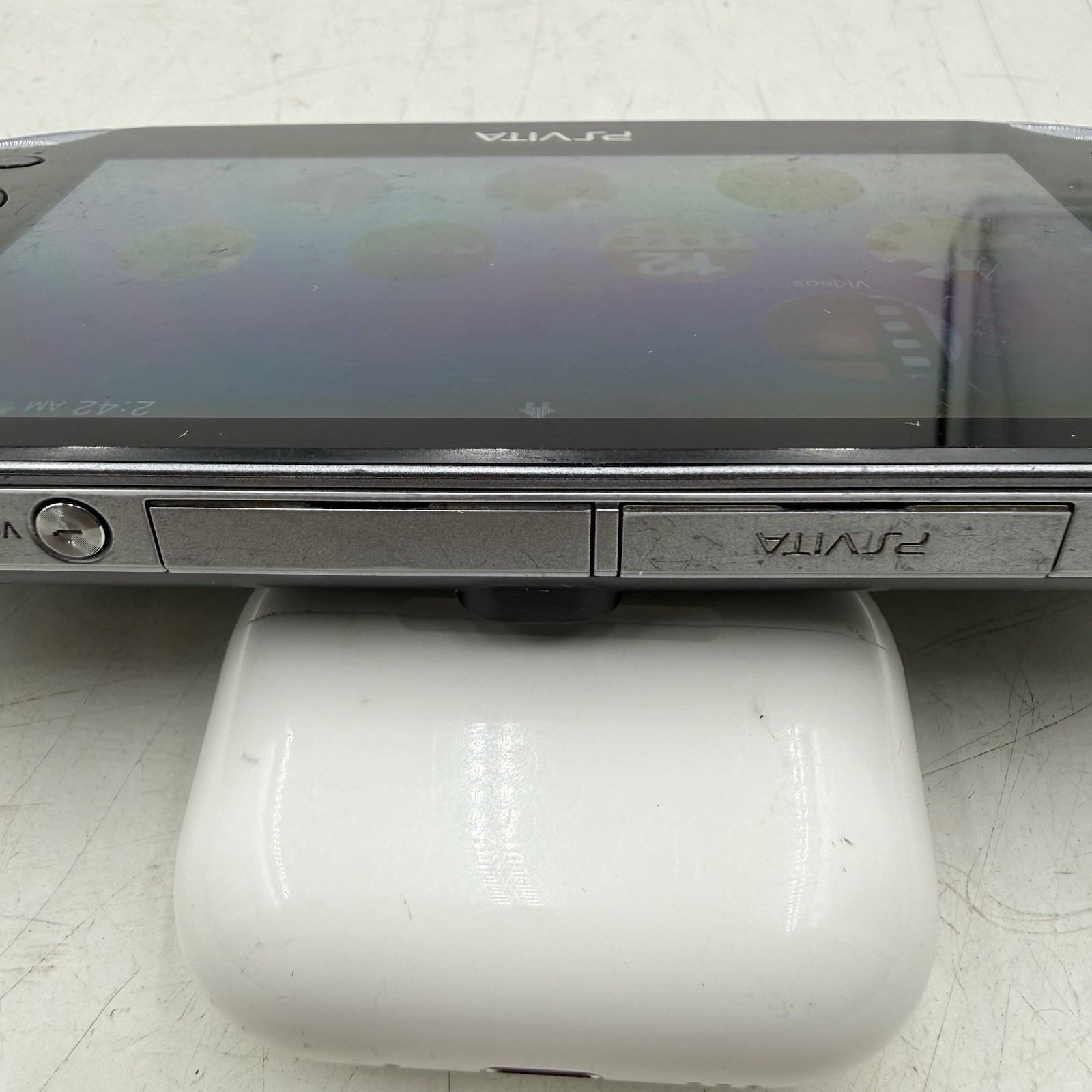 Sony PlayStation PS Vita PCH-1001 Black Handheld Console. With 2 Game Downloaded