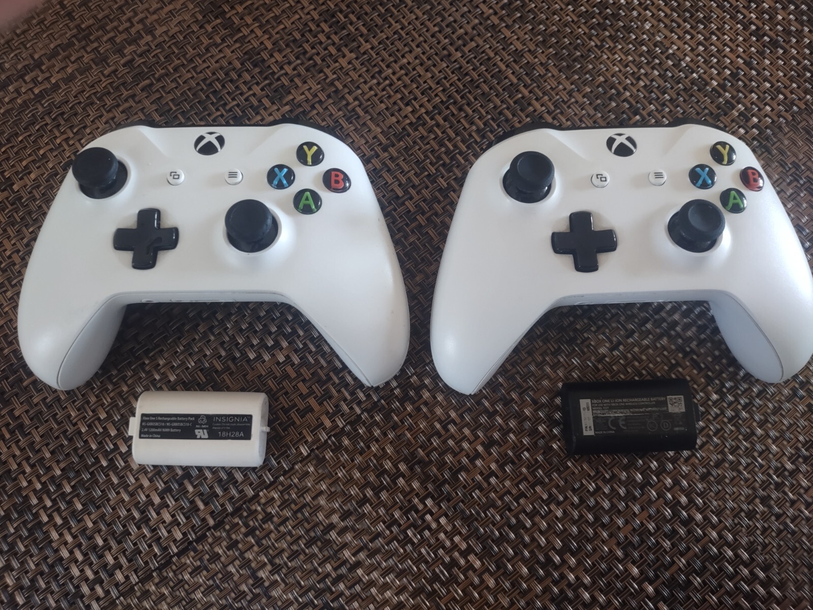 xbox one with three games, three controllers headset batteries and charger