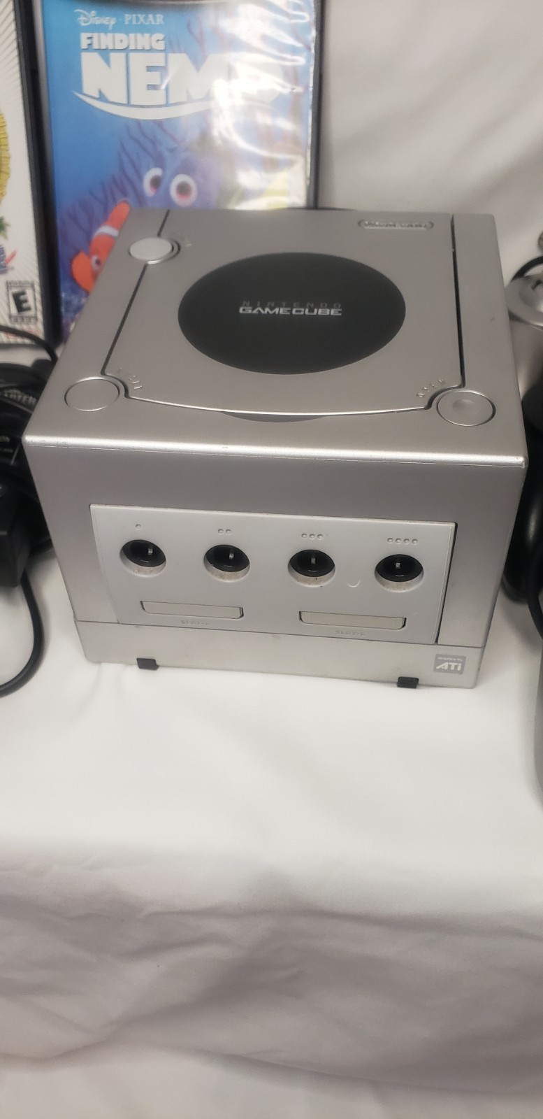 GameCube with 3 remotes, 2 games, cords, and remotes!