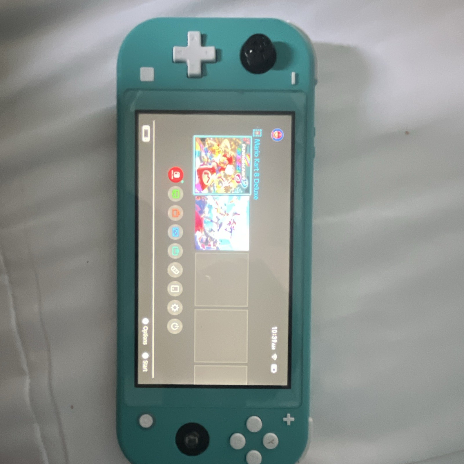 Nintendo Switch Lite Turquoise Handheld Console Wi-Fi Capability Headphone Jack