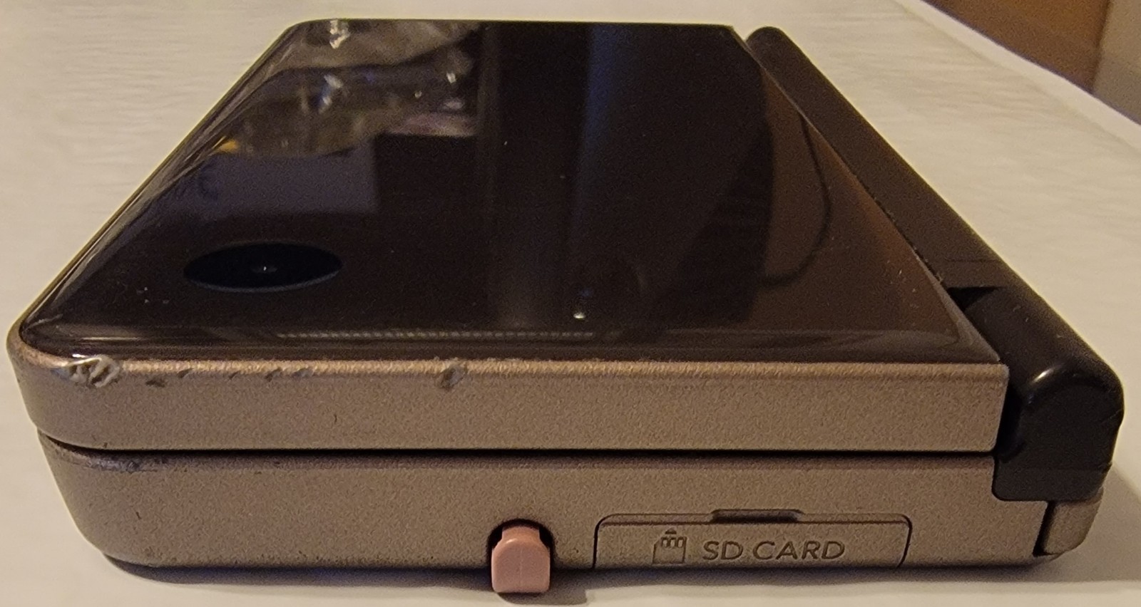 Nintendo DSi XL Bronze w/ Charger & 5 Games Mario 64 DS & New Super Mario Bros