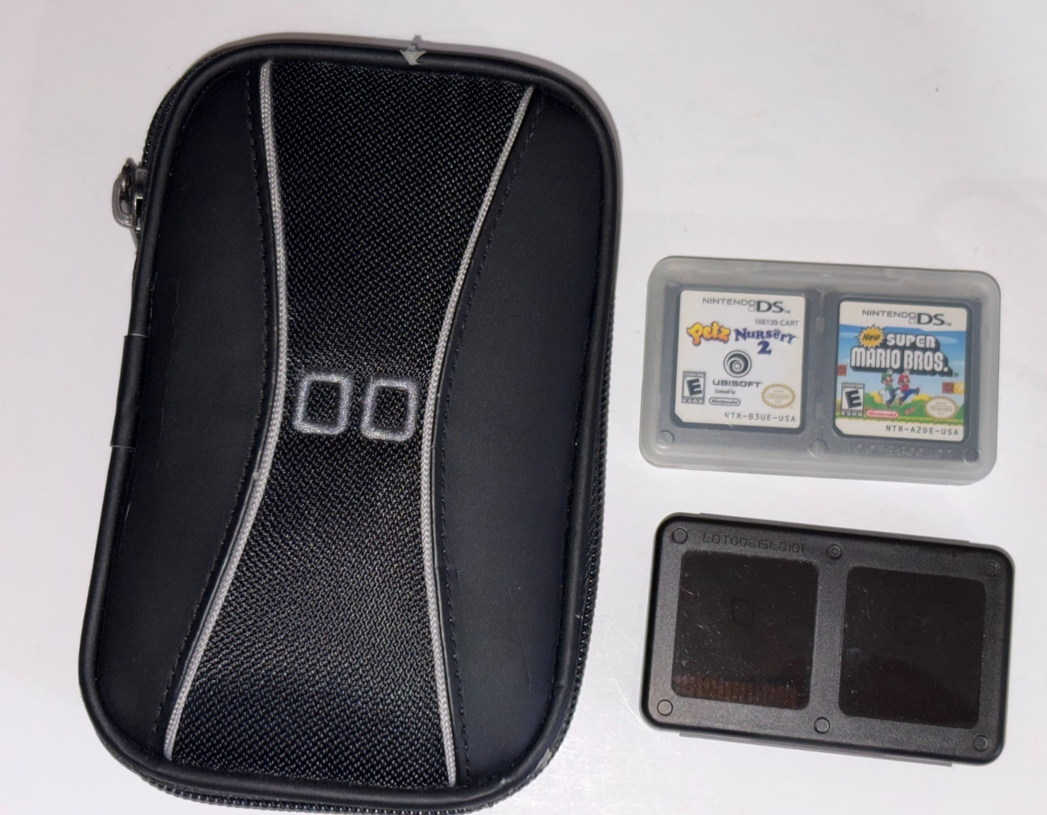 Nintendo DS Lite Red with Case, Stylus, Charger, Case, Protectors & 5 Games