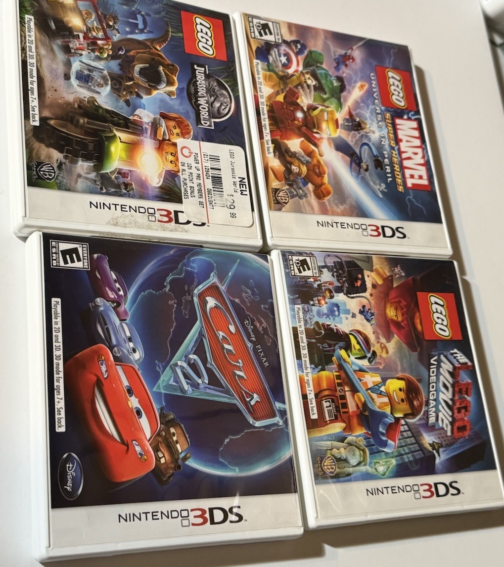 NINETENDO 3DS XL CONSOLE WITH 15 GAMES IN CASES & MANUALS 9 GAMES NO CASES