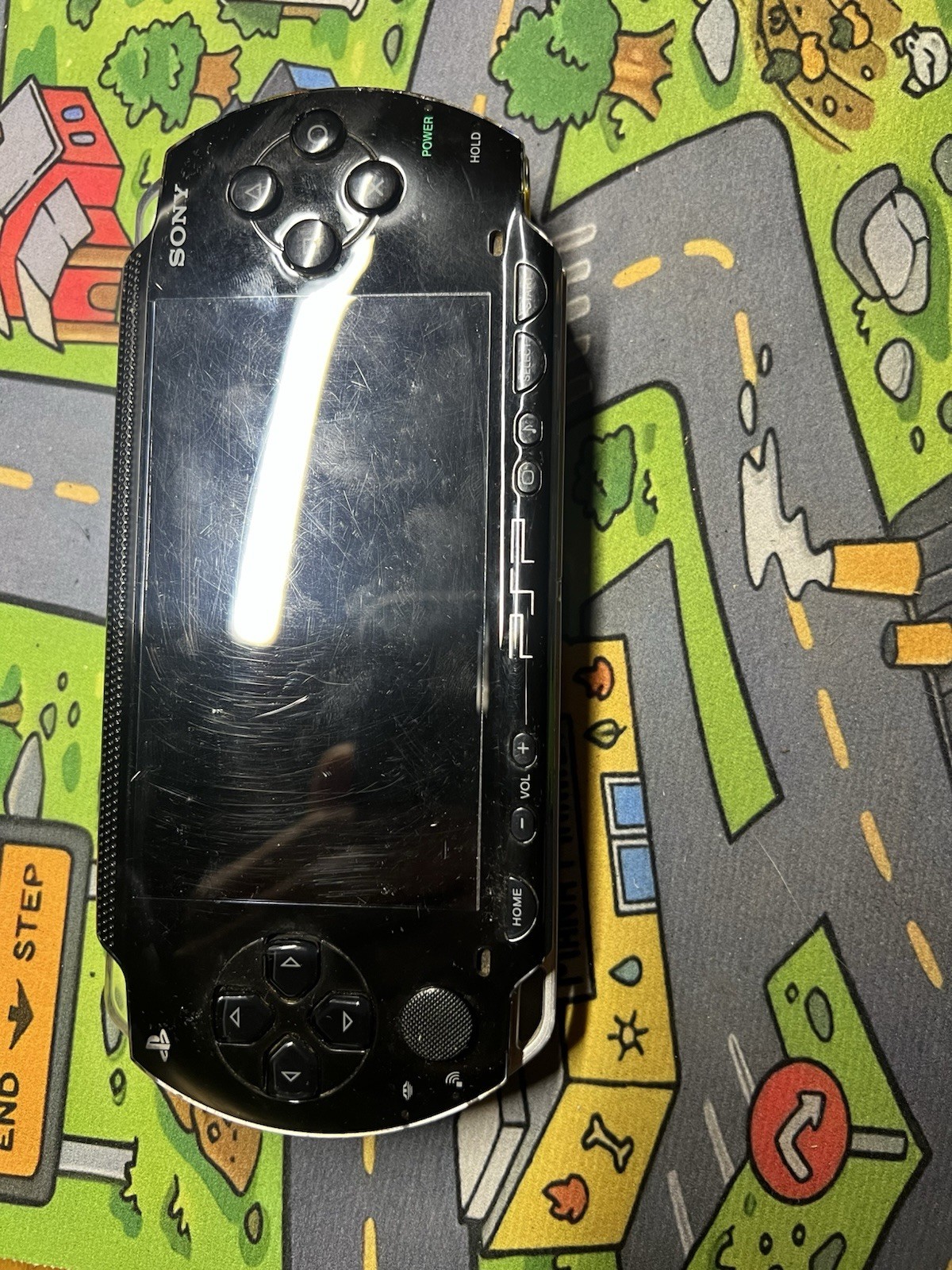 Sony PSP-1001 Black Handheld System NTSC-U/C 32MB Wi-Fi works as it should