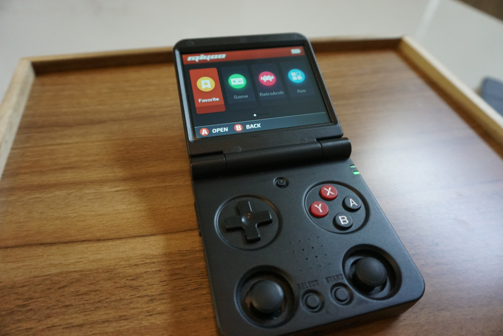 Black Miyoo Flip V2 Retro Handheld with Nostalgic Decals