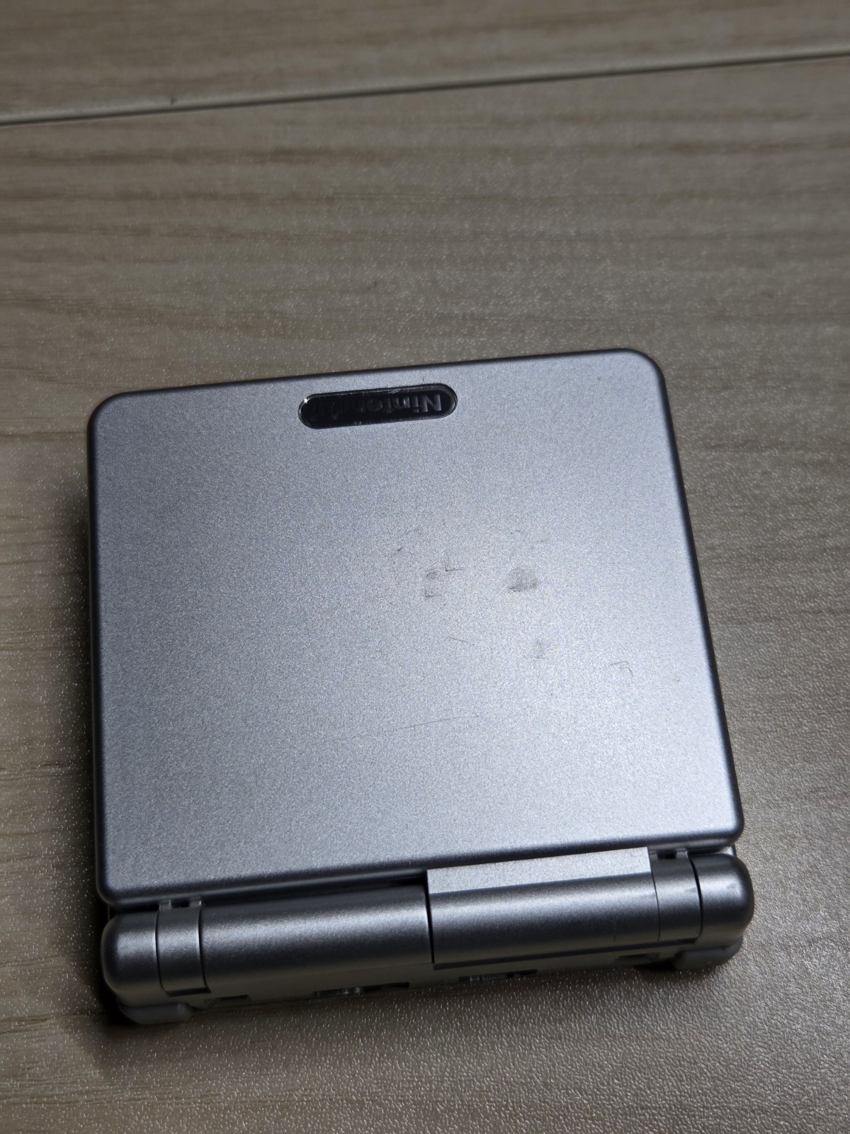 Platinum Nintendo Game Boy Advance SP (AGS-001) CIB with Pokémon Leaf Green