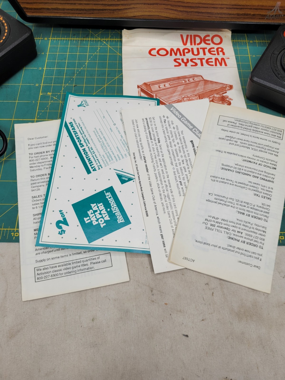 Atari 2600 console With Cords And 4 Joystick Controllers Powers On Needs Work