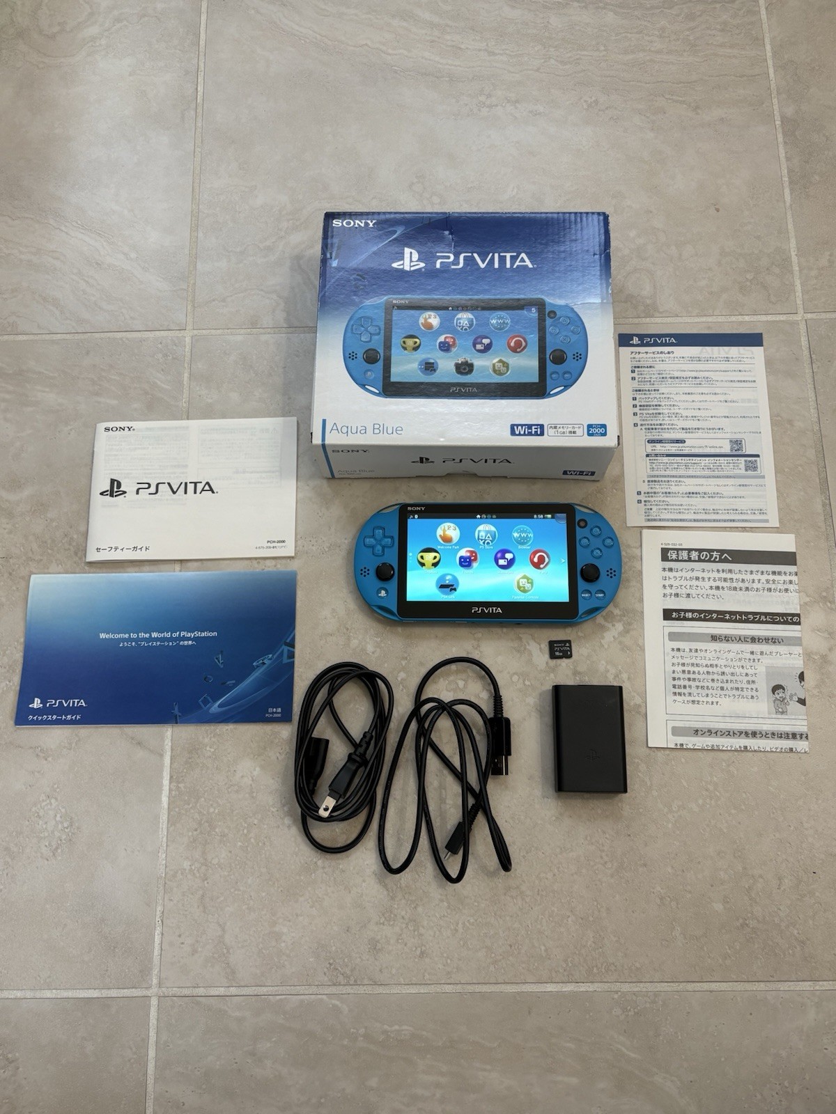Sony PS Vita PCH-2000 Complete In Box – Aqua Blue 16GB Very Good Condition