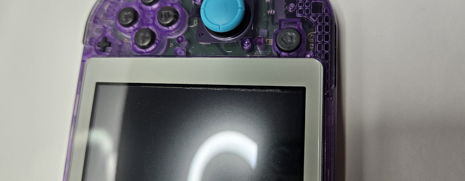 Nintendo Switch Lite – Custom Atomic Purple With Clear Gray Buttons