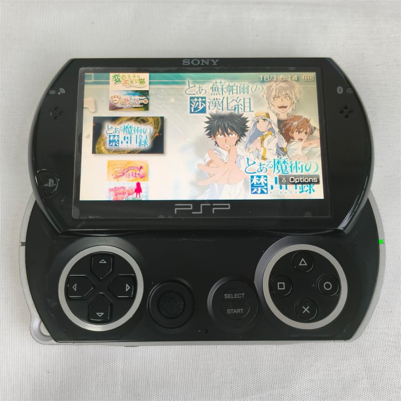 Sony PSP GO console Black with Charger PSP-N1003 Screen with protect