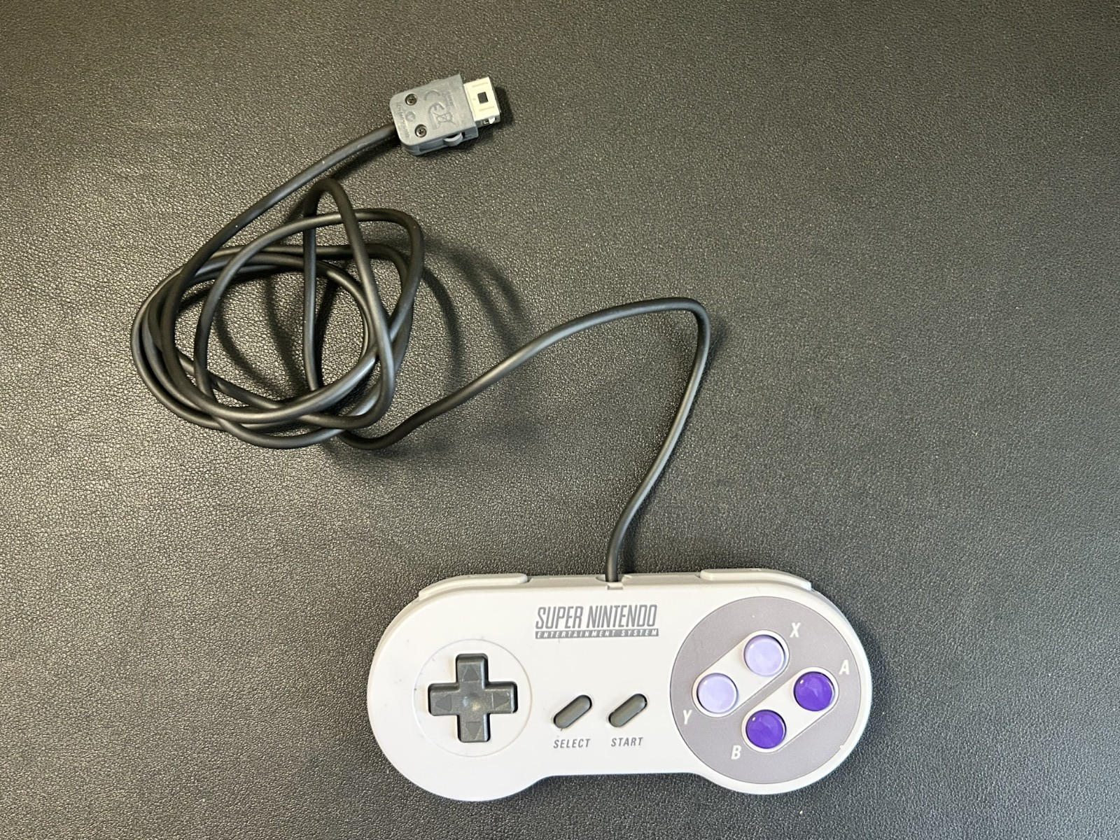 Super Nintendo Console CLV-201 with a Controller CLV-202 and power cord