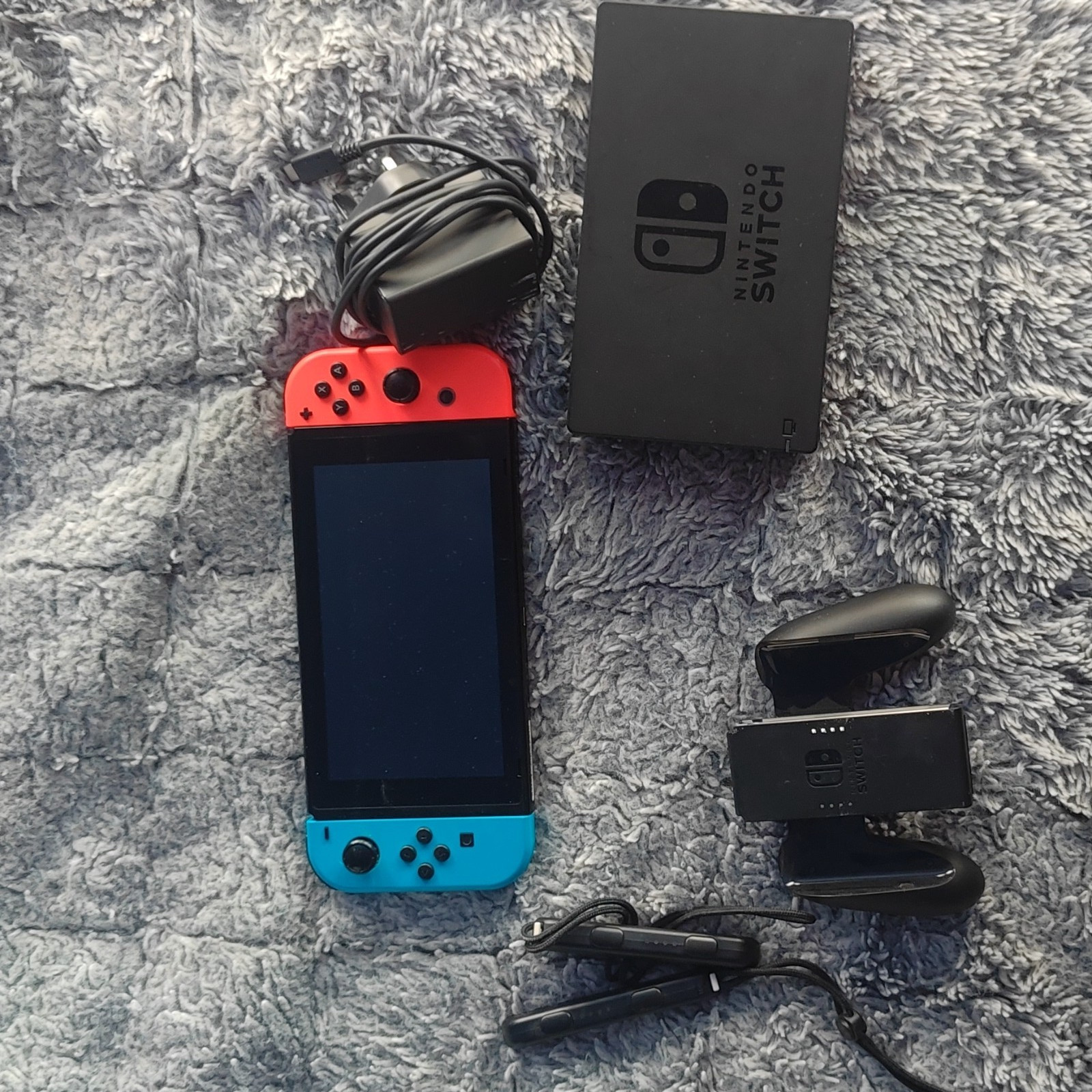 Nintendo Switch Console w/ Neon Blue/Red Joy-Con, Dock, Grip, Wrist Straps, AC