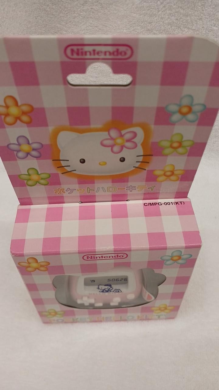 Nintendo Pocket Hello Kitty MPG-001 Unused Virtual Pet Game A2682
