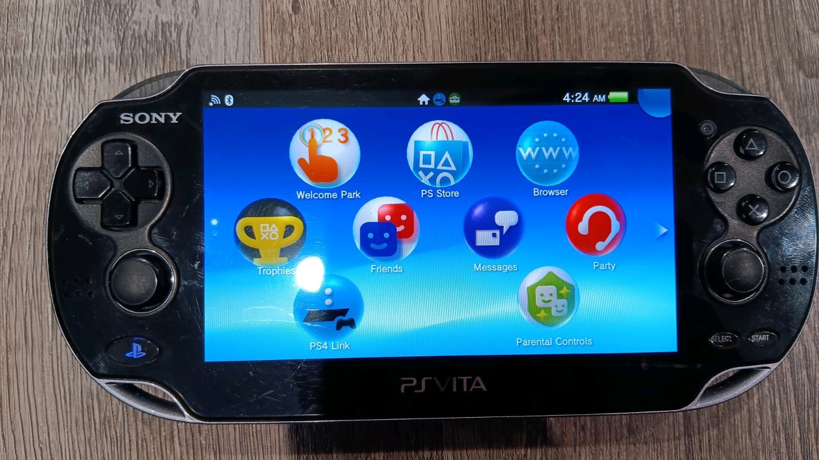 Sony PlayStation Vita PCH-1001 Black Handheld Console with OEM Charger Tested