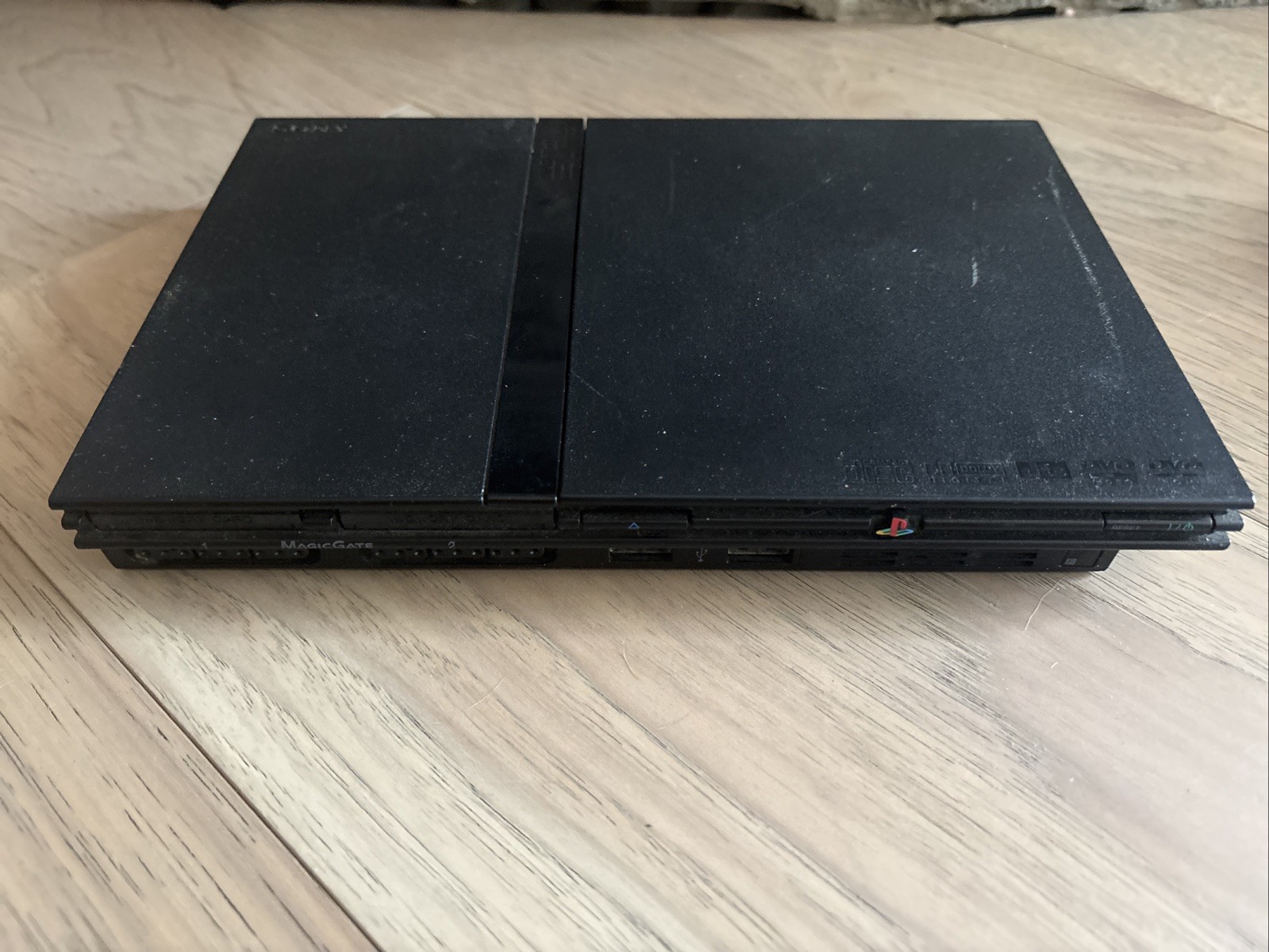 Sony Playstation 2 PS2 SCPH-77001 Slim for REPAIR/RESTORE- Powers On Reads Discs
