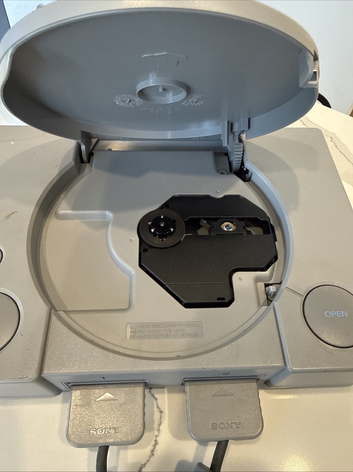 PlayStation 1 SCPH-7501 Console & Controllers. Works. Has Some Cosmetic Defects.